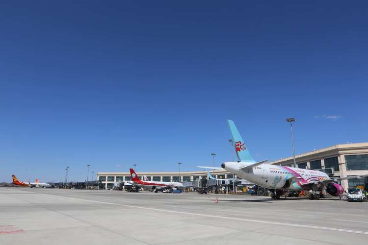 今年哈尔滨机场单日旅客吞吐量首破6万人次