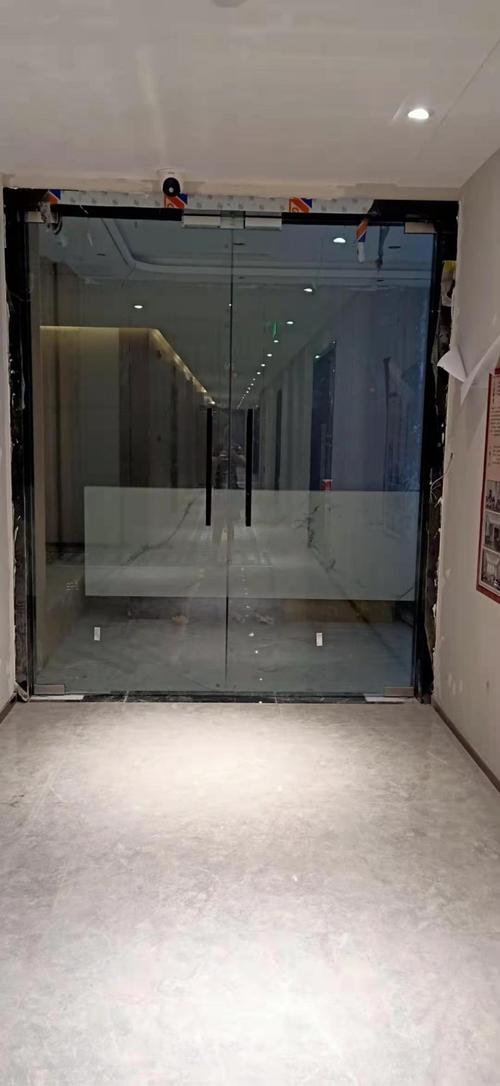 办公室商场包框玻璃地弹门不锈钢金属定制安装