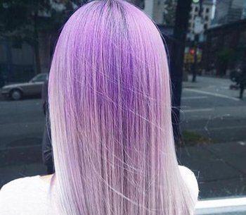 的女孩子尝试葡萄紫染发颜色,能够大胆一些,将头顶直发漂染成葡萄紫色