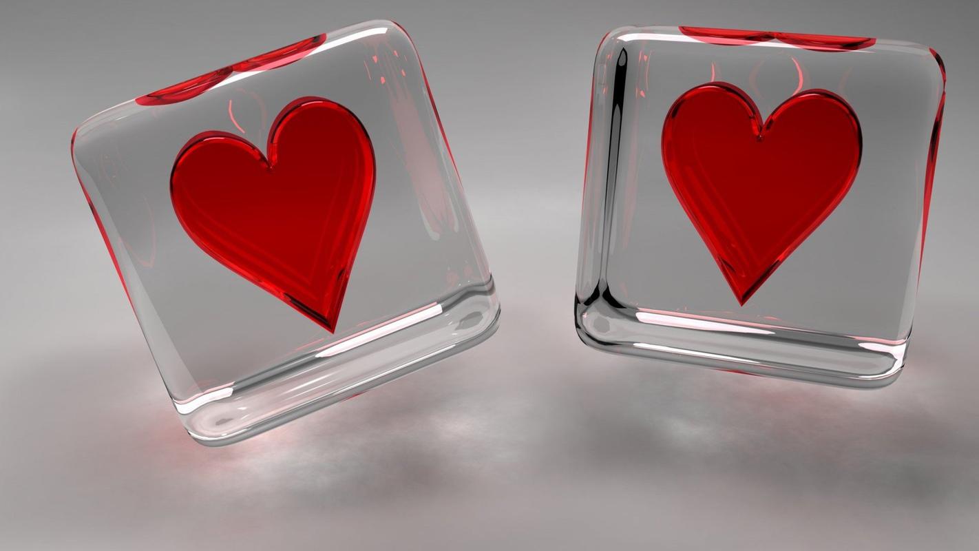 精选透明容器里的两颗红色爱心特写高清素材图片桌面壁纸下载
