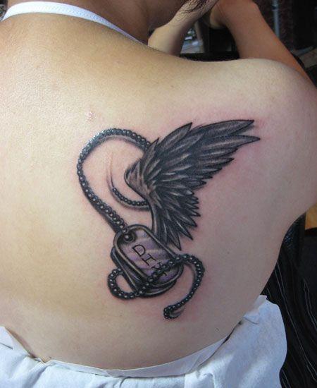 翅膀后背上的翅膀纹身图案tag标签:翅膀天使和恶魔的翅膀纹身tag标签