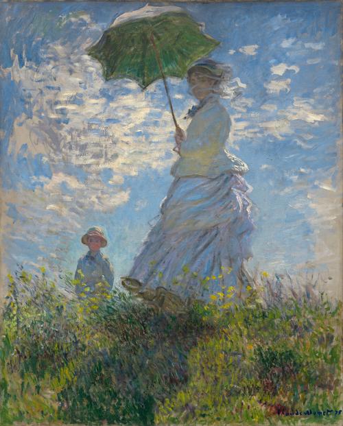 持太阳伞的妇人莫奈夫人和她的儿子