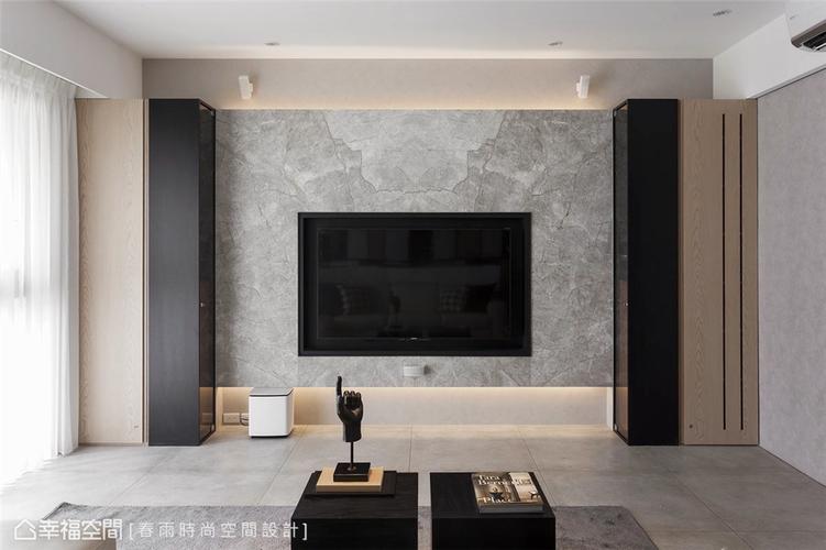 电视墙石材电视墙表面呈现出自然纹理增添大器质感,柜体采左右对称