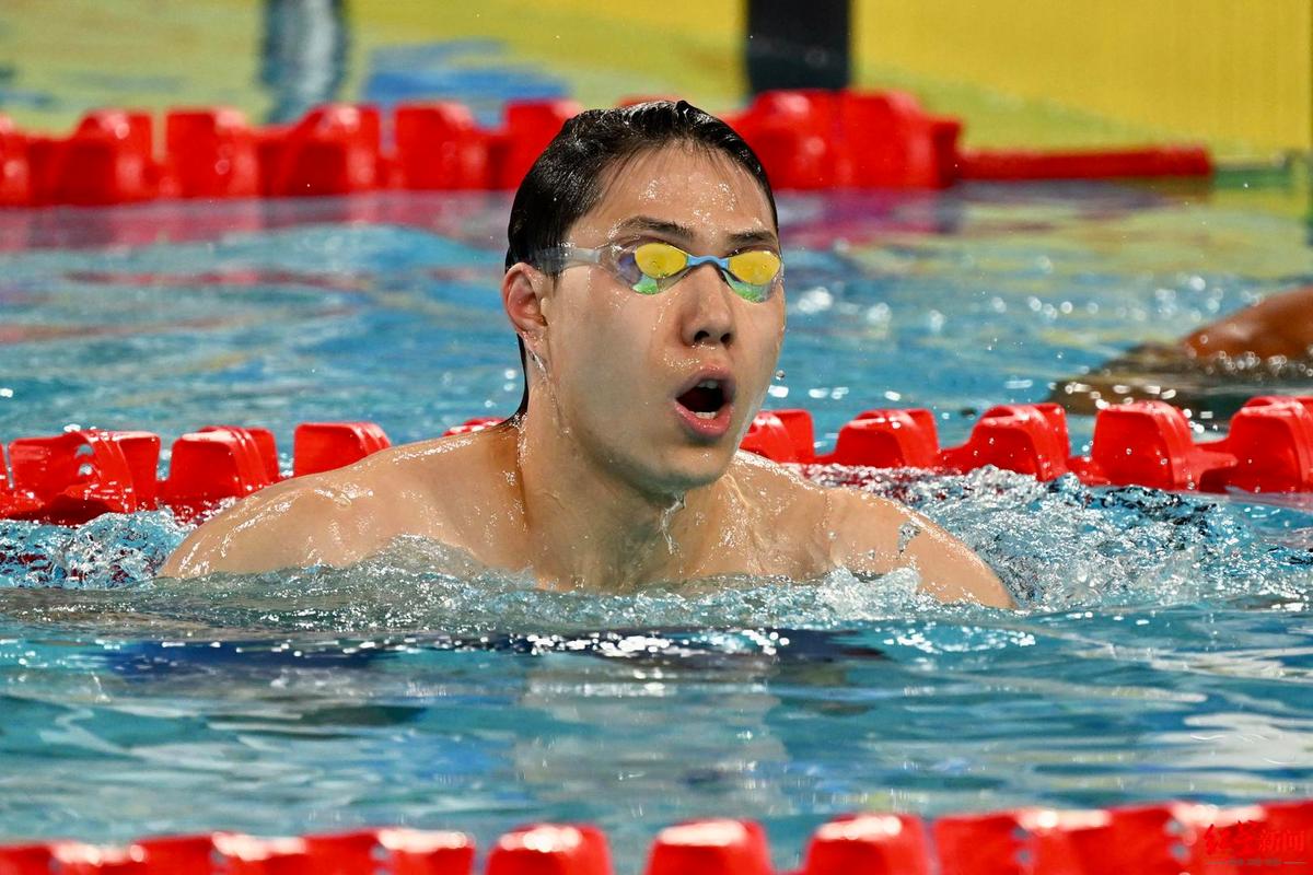 游泳锦标赛为中国队拿下4枚金牌的"蛙王"覃海洋在第六组参加了男子100