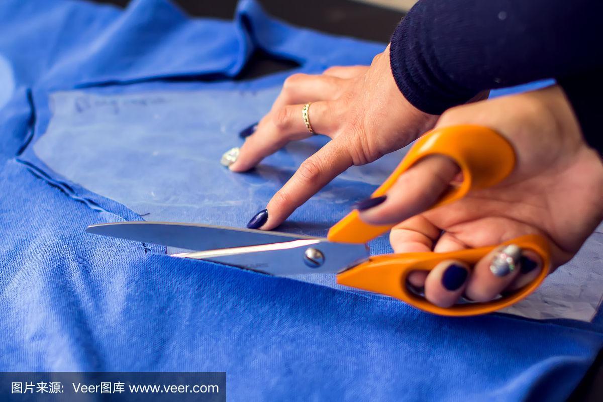 裁缝裁剪衣服.服装和时尚概念的制造