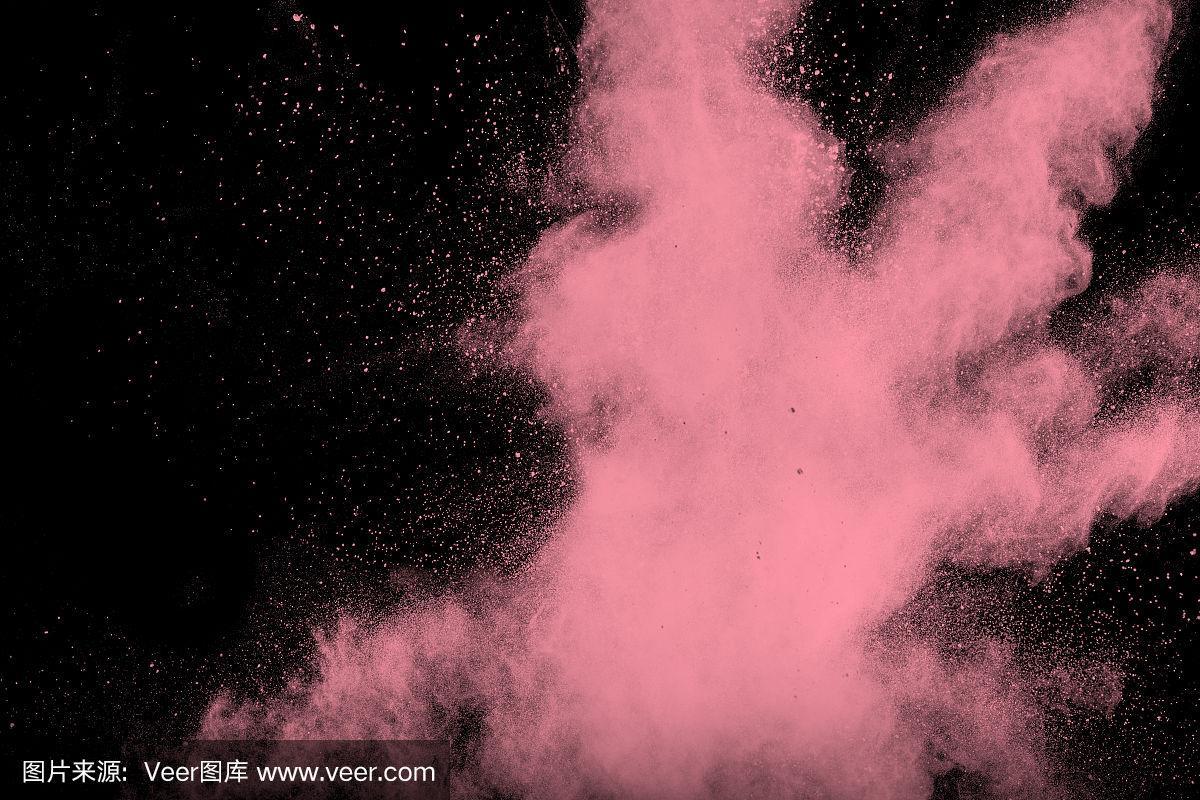 抽象的粉色粉尘爆炸在黑色背景.
