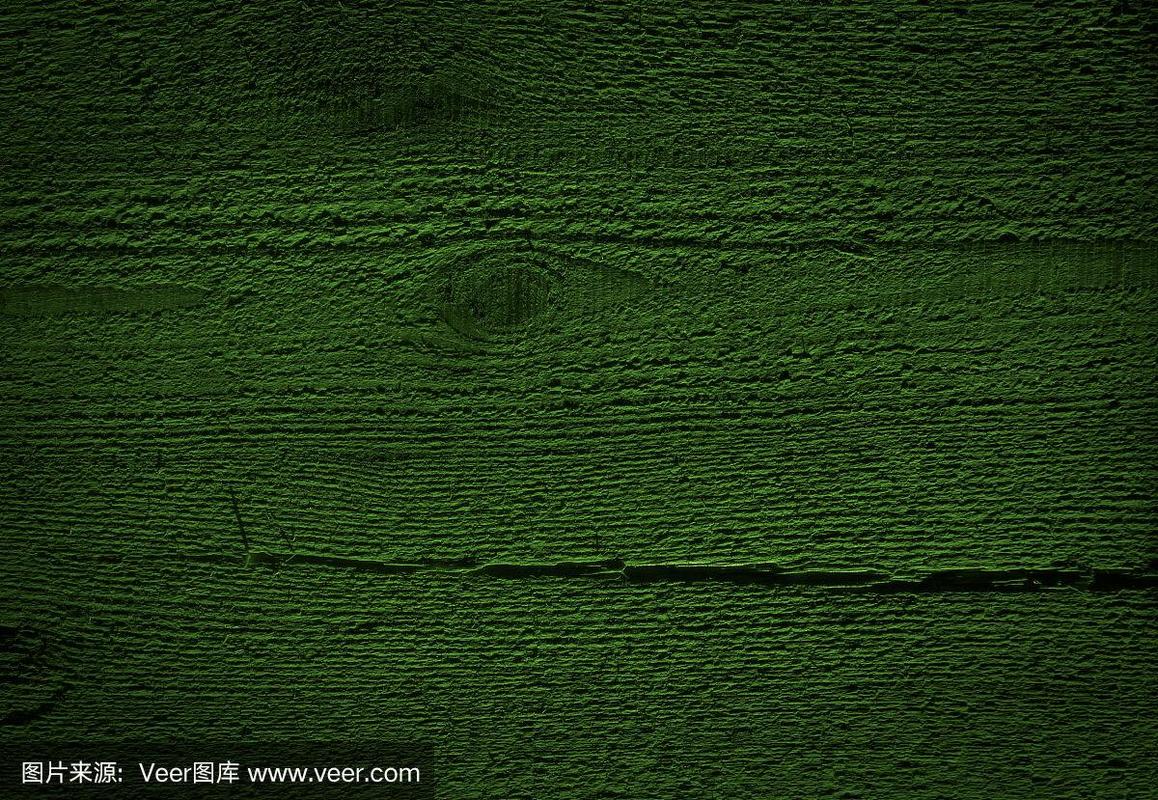 色调深绿色木材的纹理.天然松木背景.粗糙的锯板平面.