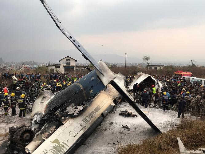 passenger plane crashes at nepal airport; dozens