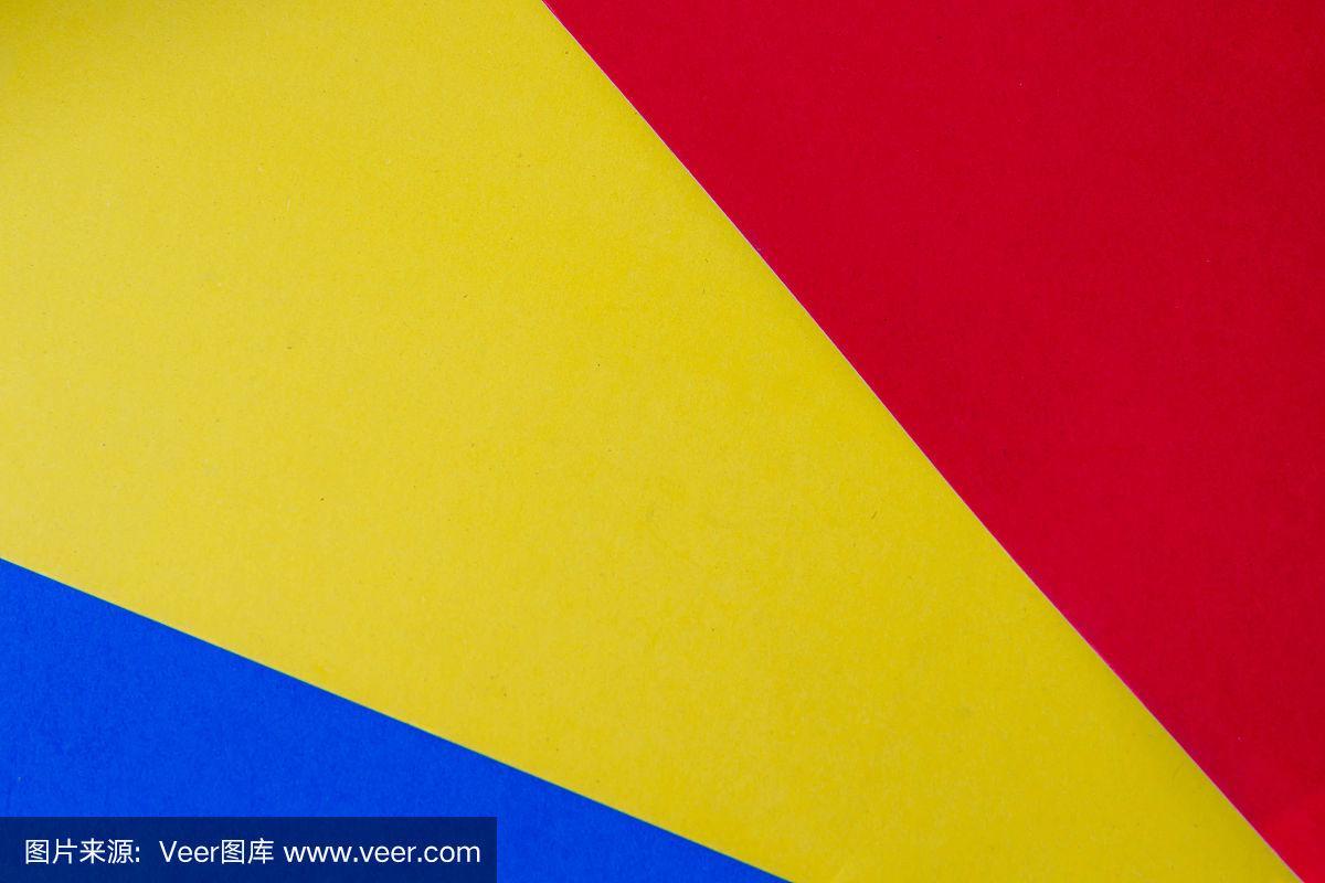 黄色,蓝色和红色的纸张背景.三原色概念