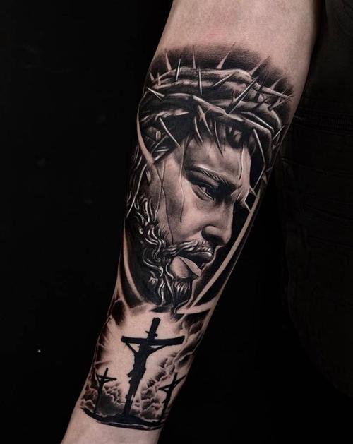 原创耶稣纹身图片_手臂欧美写实纹身图案