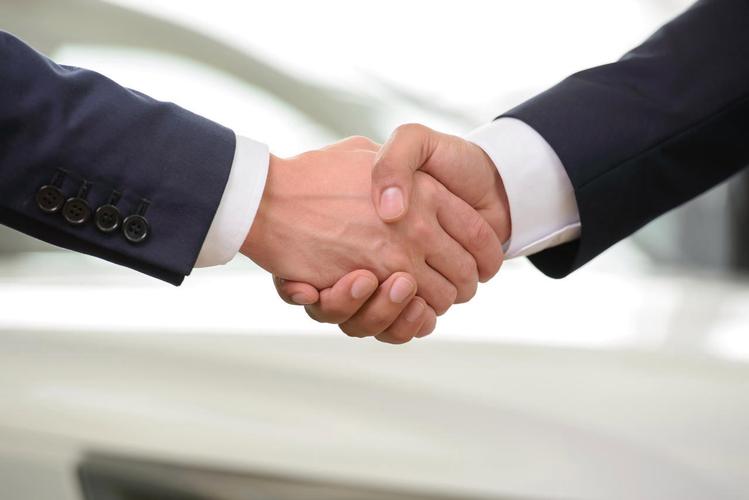 商务人士握手特写合作团结握手团结手势合作平台商务合作握手